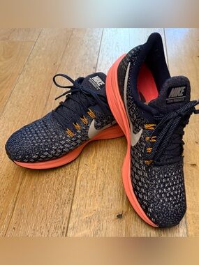 Nike Women's Zoom Pegasus 35 Running Shoes - Navy with Coral and Gold Details.